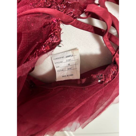 Prom Bay size 6 prom dress in the color wine. Corset with Lace up back & Ruffles - Picture 2 of 9